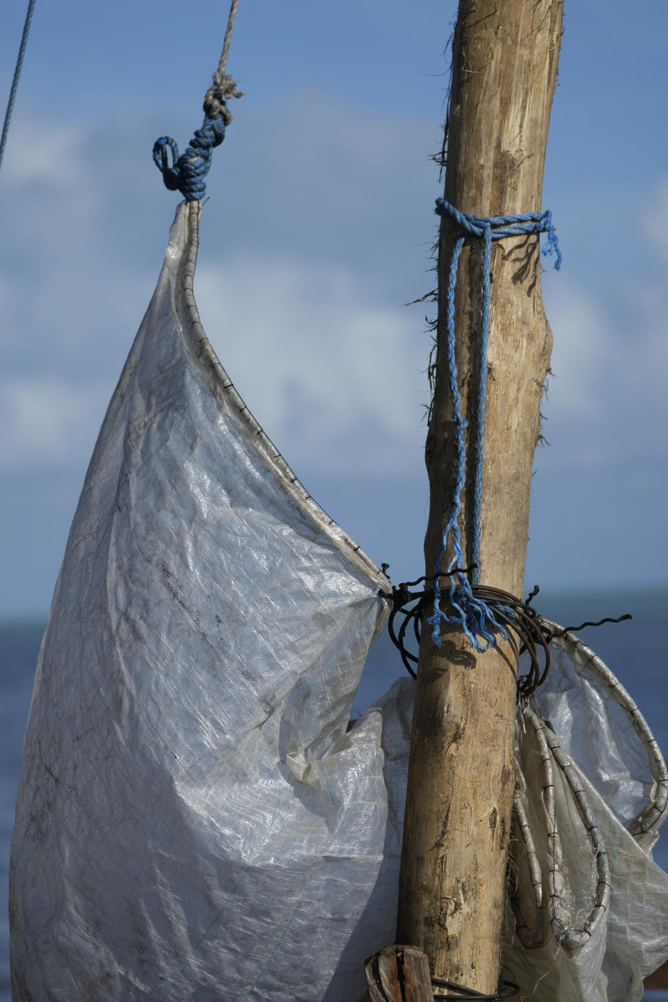 A sail and mast of a recently arrived rustic boat are shown, Wednesday, Jan. 4, 2023, in Islamorada, Fla. More than 500 Cuban immigrants have come ashore in the Florida Keys since the weekend, the latest in a large and increasing number who are fleeing the communist island. (AP Photo/Wilfredo Lee)