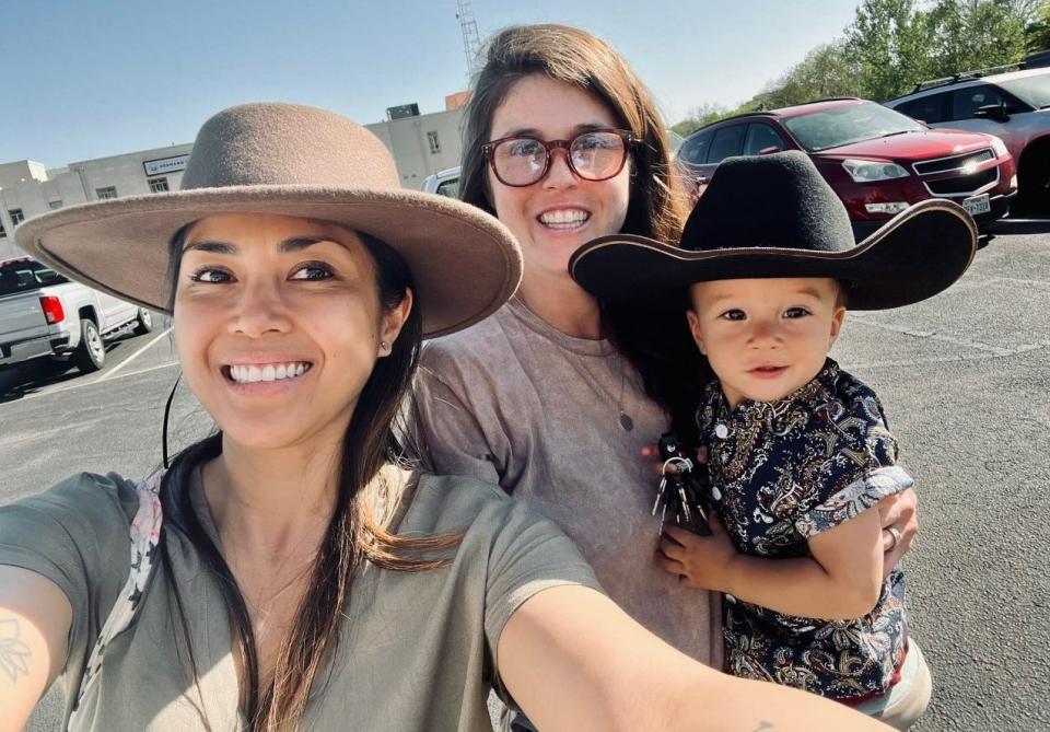 Wives Sheree Bautista (left) and Shauna Painter travel around the country together with their son Sage.