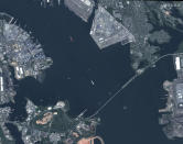 FILE - This satellite image provided by Maxar Technologies shows the overview of the Francis Scott Key Bridge in Baltimore, Md., on May 6, 2023. On Tuesday, March 26, 2024, the container ship Dali lost power and collided with the major bridge causing the span to buckle into the river below. (Maxaar Technologies via AP, File)
