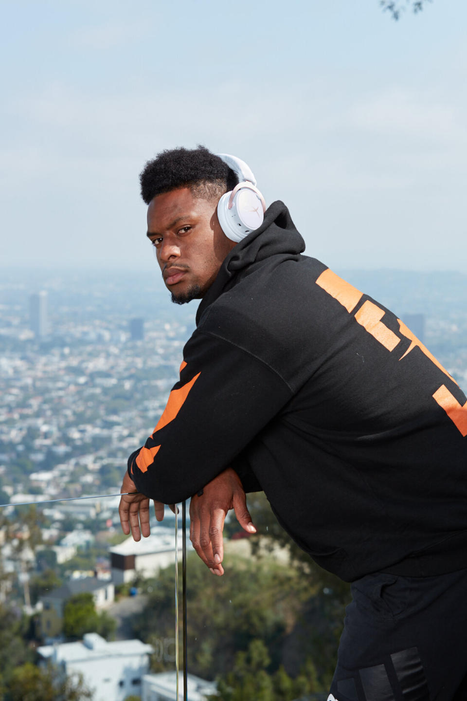 It takes a special celebrity who can look cool while wearing <a href="JuJu Smith-Schuster Following is the link: https:/www.hyperxgaming.com/us/headsets/cloud-mix-wired-gaming-headset-with-bluetooth" target="_blank" rel="noopener noreferrer">soup-can-shaped headphones</a> on their ears. Pittsburgh Steelers wide receiver Juju Smith-Schuster must be that guy, because no one else comes to mind. But again, what's with the moody look? Do pissed-off-looking celebrities do a better job of selling quality headphones than non-pissed-off-looking people? Where's the science?