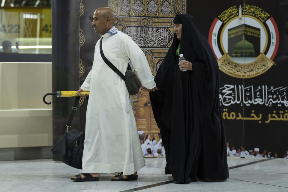 Iraqi pilgrims are heading to Mecca for Haj, the holiest place in Islam, at the Baghdad Airport in Baghdad, Iraq, Wednesday, June 7, 2023. (AP Photo/ Hadi Mizban)