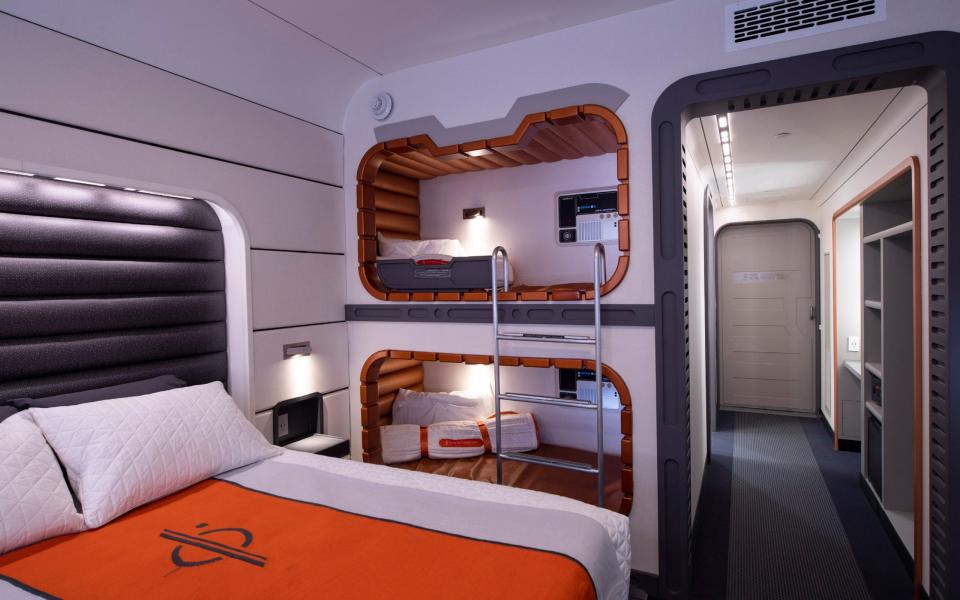 room with spacey orange beds - David Roark 