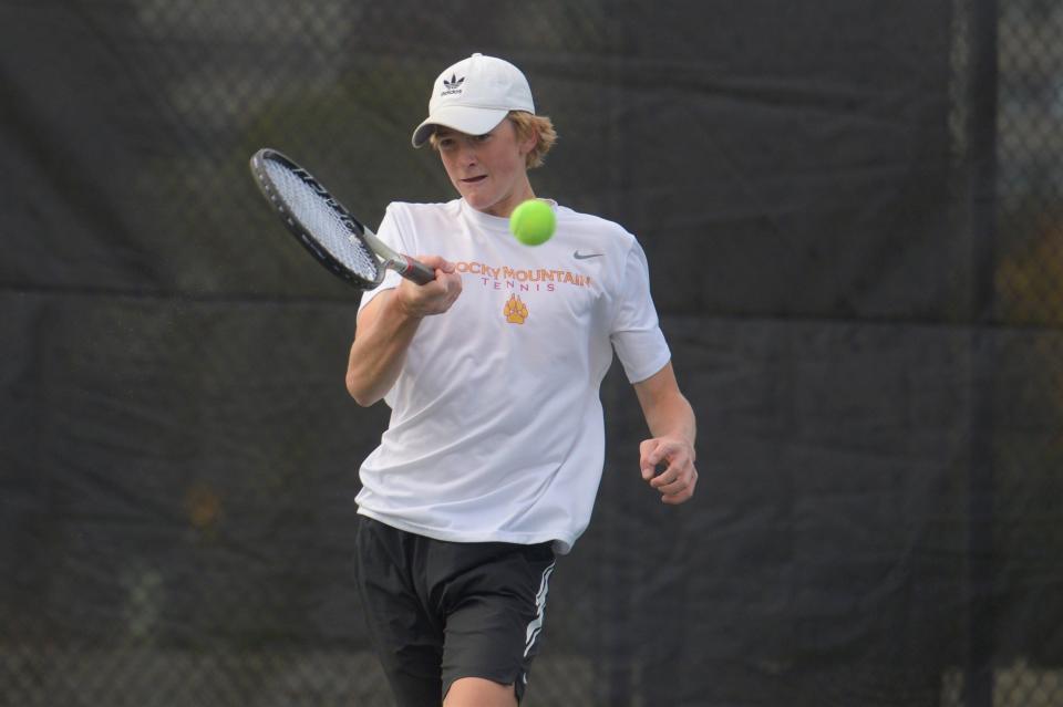 Rocky Mountain No. 1 singles player Bridger Galyardt hits a shot during the Class 5A state tournament at Gates Tennis Center on Thursday, Oct. 14, 2021.