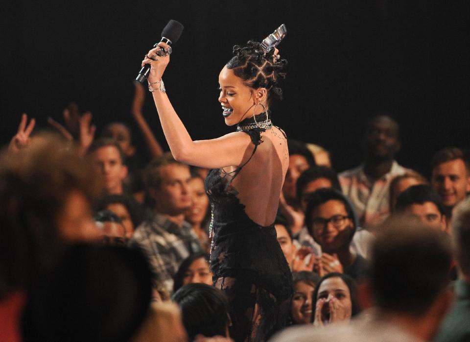 Rihanna accepts the award for song of the year for "Stay" at the iHeartRadio Music Awards at the Shrine Auditorium on Thursday, May 1, 2014, in Los Angeles. (Photo by Chris Pizzello/Invision/AP)