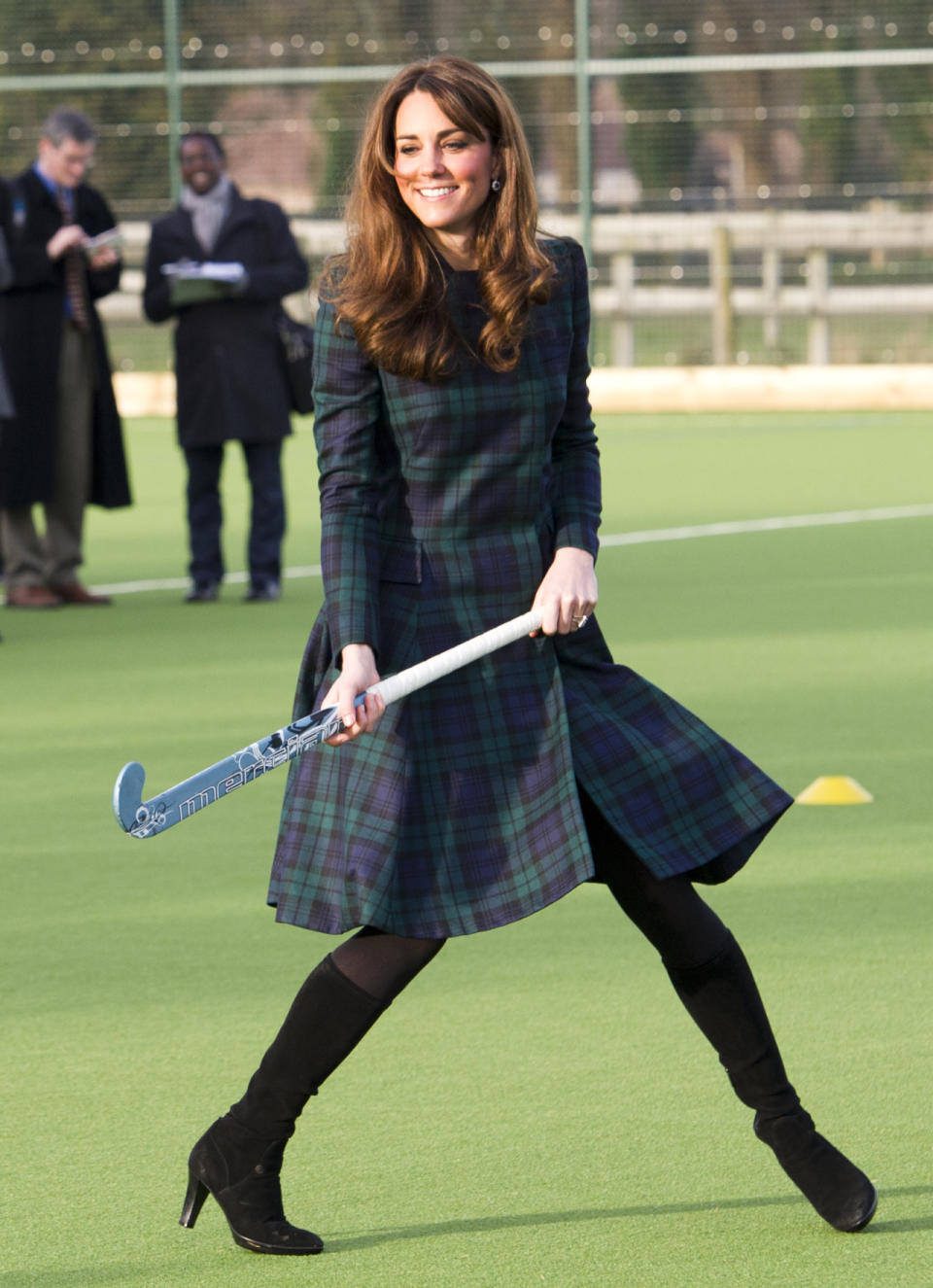 <p>Kate visited her old school in a tartan coat by McQ paired with her favourite black Aquatalia boots. </p><p><i>[Photo: PA]</i></p>