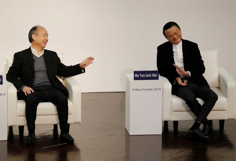 SoftBank Group founder and CEO Masayoshi Son and Alibaba founder and former Chairman Jack Ma attend the Tokyo Forum 2019 in Tokyo