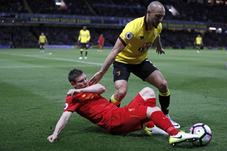 Watford's midfielder Nordin Amrabat vies with Liverpool's midfielder James Milner (L) during the English Premier League football match between Watford and Liverpool at Vicarage Road Stadium in Watford, north of London on May 1, 2017