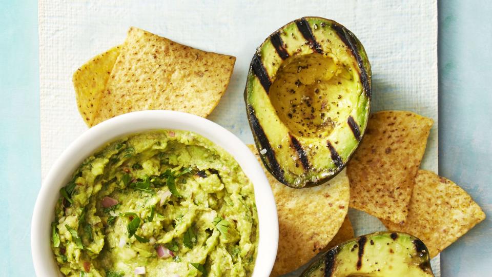 smoky guacamole with charred avocado and chips on the side