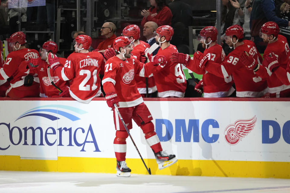 Detroit Red Wings center Dylan Larkin (71) celebrates his goal against the Buffalo Sabres in the first period of an NHL hockey game Sunday, April 7, 2024, in Detroit. (AP Photo/Paul Sancya)