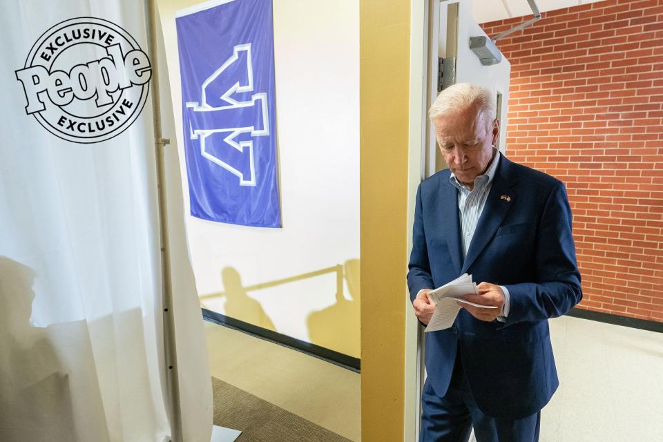 Biden takes a moment to review notes before speaking to a group of supporters at a town hall at Wesleyan University in Mount Pleasant, Iowa , on June 11, 2019.