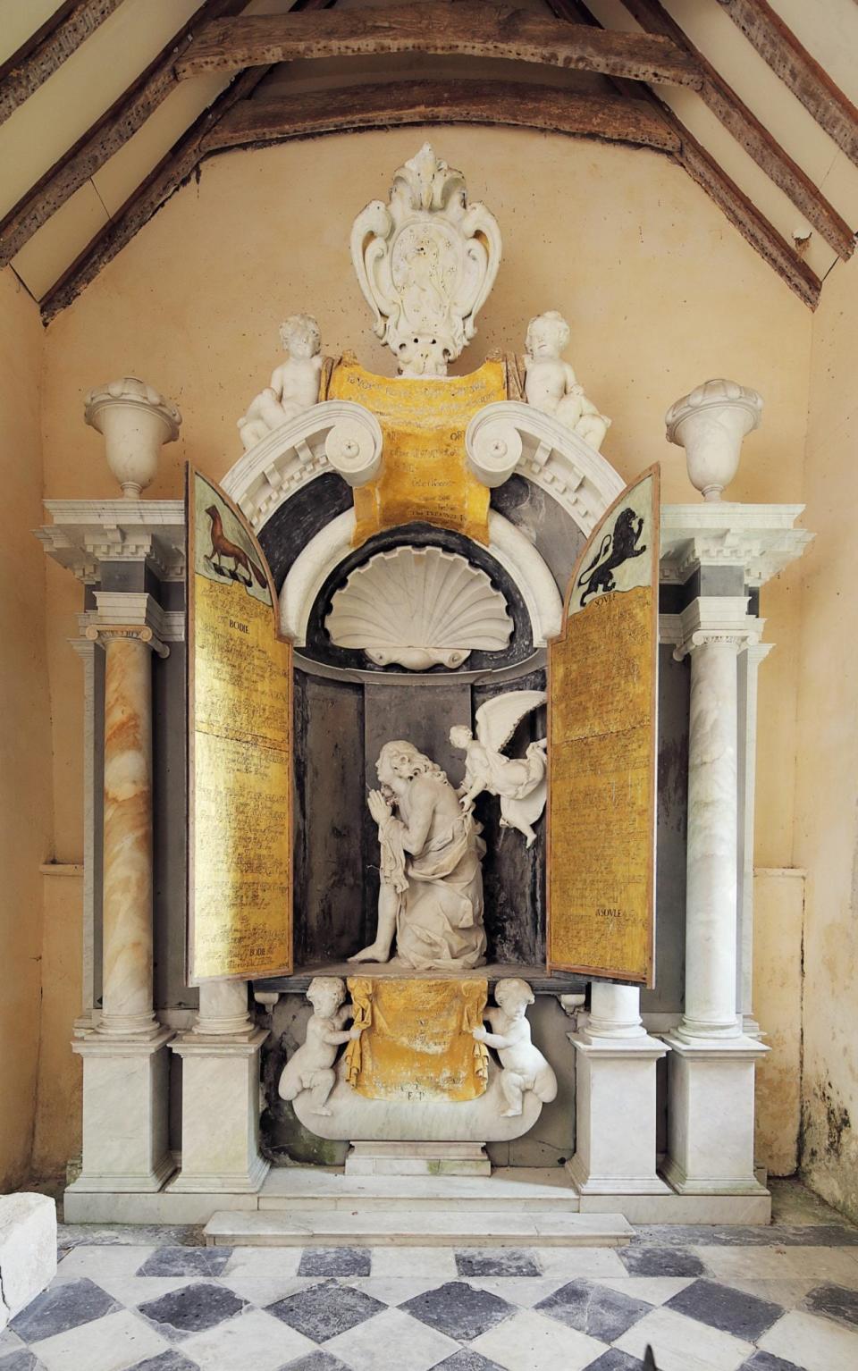 Final leg: at West Dean in Wiltshire, Robert Pierrepont (1634-69), who died after having his leg cut off – thereby missing out on two earldoms – is depicted in his burial shroud, his right leg sawn through, rising at the Last Judgment - CB Newham