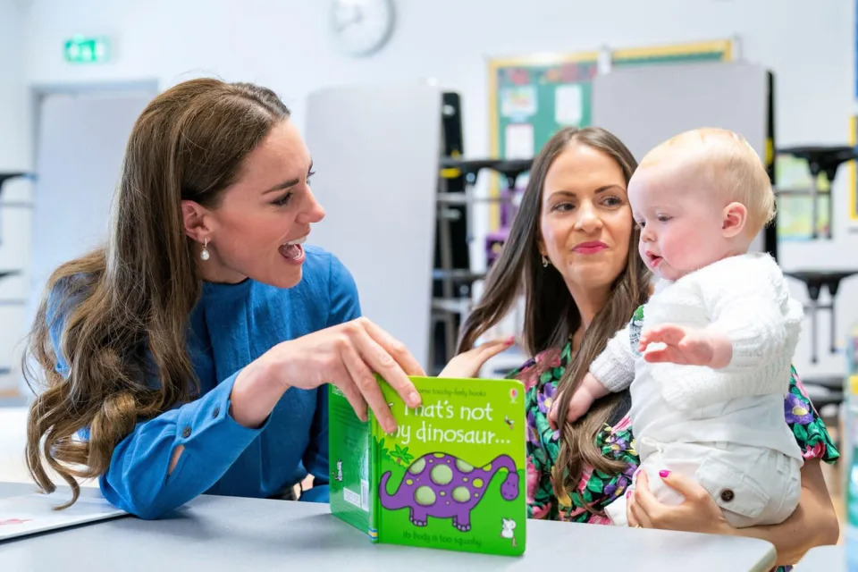 The Duchess of Cambridge meets Laura Molloy and her 10-month-old son Saul Molloy during a visit to St. John&#39;s Primary School