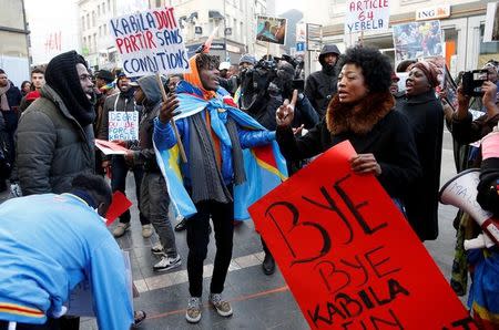 Demonstrators chant slogans against plans of Democratic Republic of Congo's President Joseph Kabila to stay in office past the end of his term, during a protest in central Brussels, Belgium, December 19, 2016. REUTERS/Francois Lenoir