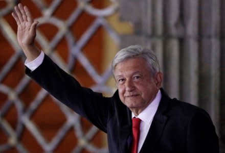 Leftist front-runner Andres Manuel Lopez Obrador of the National Regeneration Movement (MORENA) gestures while leaving the Palacio de Mineria after the first presidential debate in Mexico City, Mexico April 22, 2018. REUTERS/Henry Romero