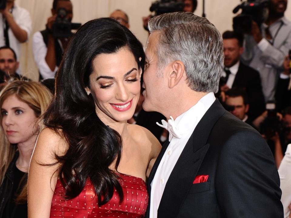 George Clooney and Amal Clooney.