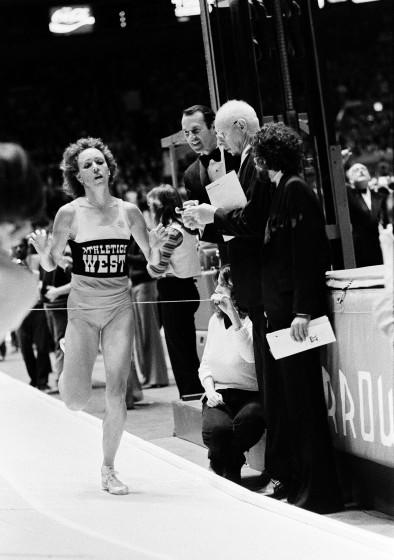 Mary Decker, representing the Athletics West, crosses the finish line at the Millrose Games to win the women's 1,500-meter event at Madison Square Garden in New York, Feb. 9, 1980. (AP Photo/Richard Drew)