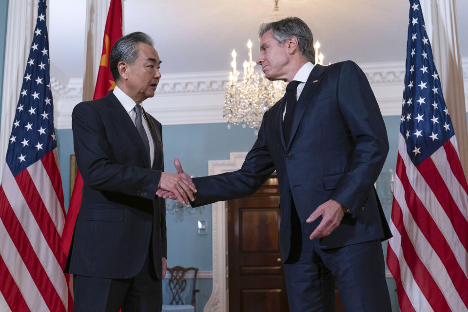 Secretary of State Antony Blinken shake hands with China's Foreign Minister Wang Yi after a bilateral meeting at the State Department in Washington, Thursday, Oct. 26, 2023. (AP Photo/Jose Luis Magana)