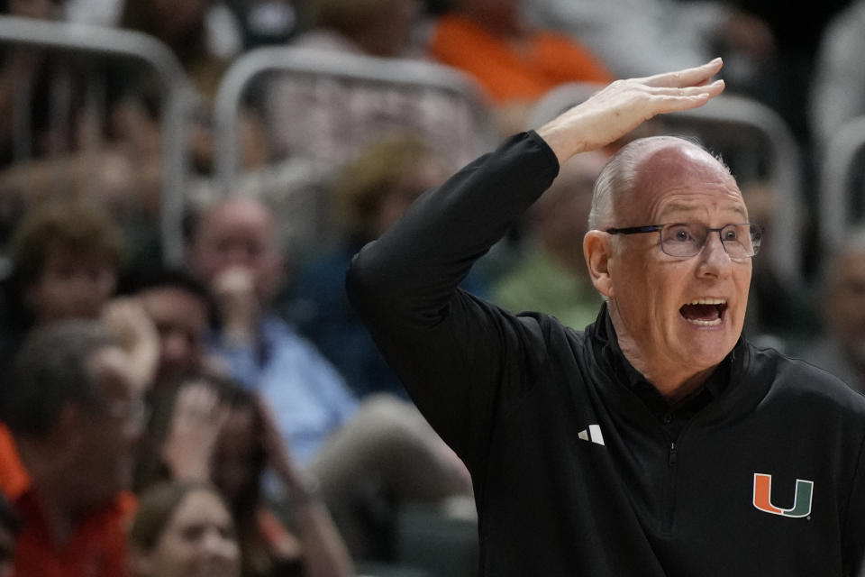 Miami head coach Jim Larranaga gestures from the sideline during the first half of an NCAA college basketball game against the New Jersey Institute of Technology, Monday, Nov. 6, 2023, in Coral Gables, Fla. (AP Photo/Rebecca Blackwell)