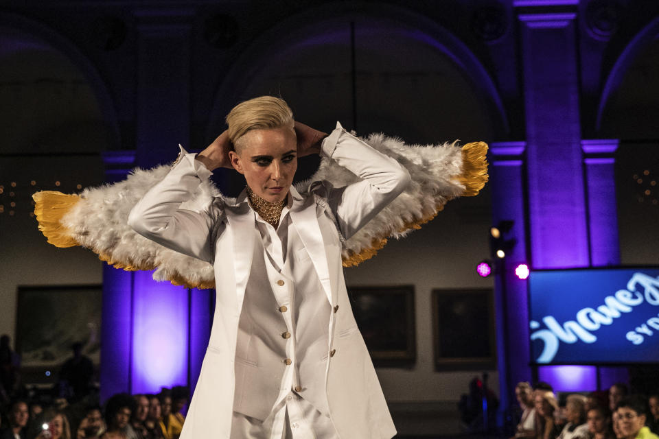 The Shane Ave. collection is modeled during the dapperQ fashion show at the Brooklyn Museum on Thursday Sept. 5, 2019, in New York. (AP Photo/Jeenah Moon)