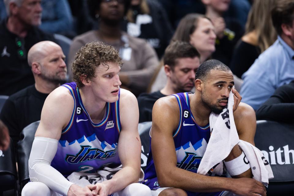 Utah Jazz forward Lauri Markkanen and Utah Jazz guard Talen Horton-Tucker look on