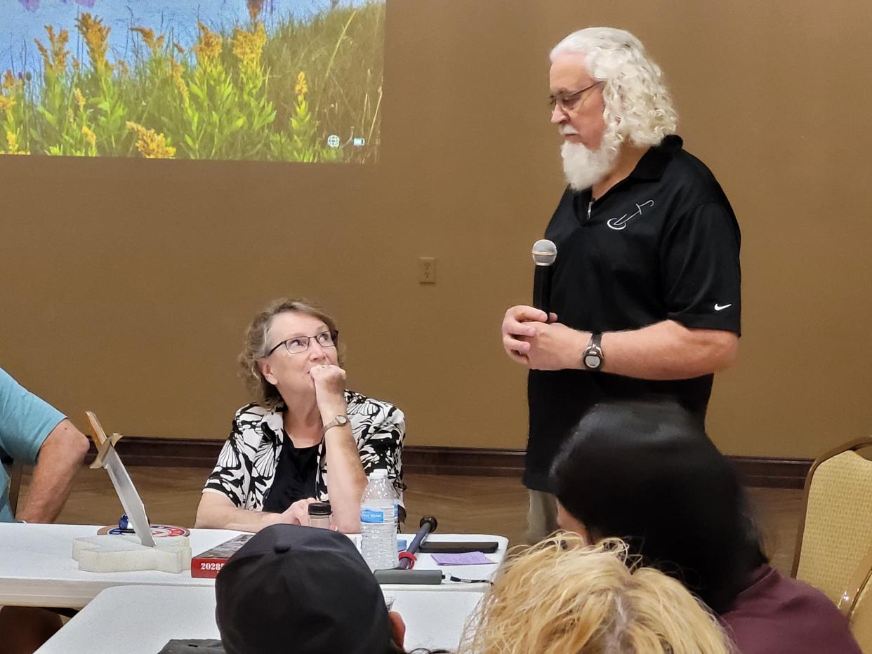 Albert Schlabs talks about his creation, the world's largest Bowie knife, Wednesday, Aug. 16, 2023.