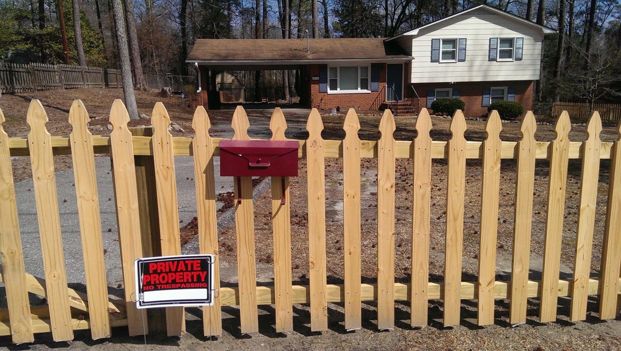 A fence has been built around the house rapper J. Cole owns on Forest Hills Drive, off of Cain Road in 2015. Fans had been climbing on top of the house to get pictures taken, to imitate a pose Cole did on the cover of his latest album, 2014 Forest Hills Drive album.