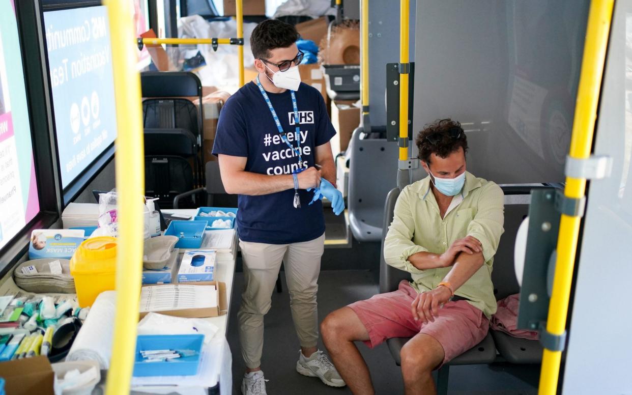 Young people received their Covid vaccines on a jab bus at Latitude Festival, in Suffolk, at the weekend - Jacob King/PA Wire