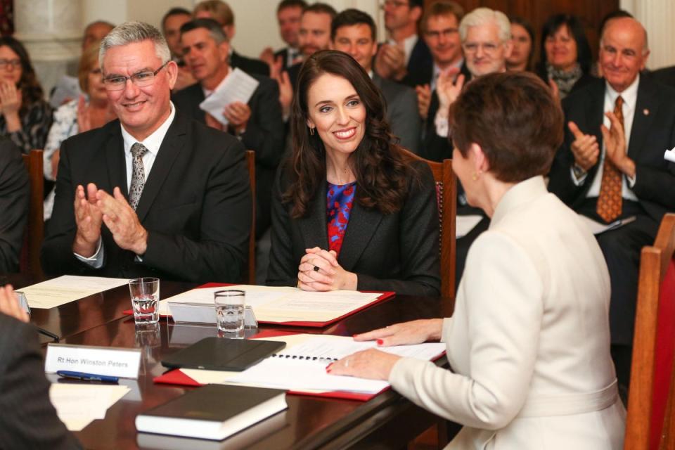 Prime Minister Jacinda Ardern is sworn in by Governor-General Dame Patsy Reddy while deputy Labour leader Kelvin Davis looks on during a swearing-in ceremony at Government House on 26 October 2017 in Wellington, New Zealand (Getty Images)