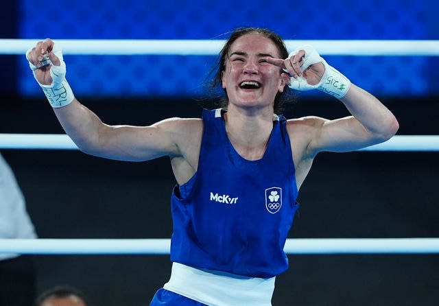 Kellie Harrington celebrates victory over China's Wenlu Yang