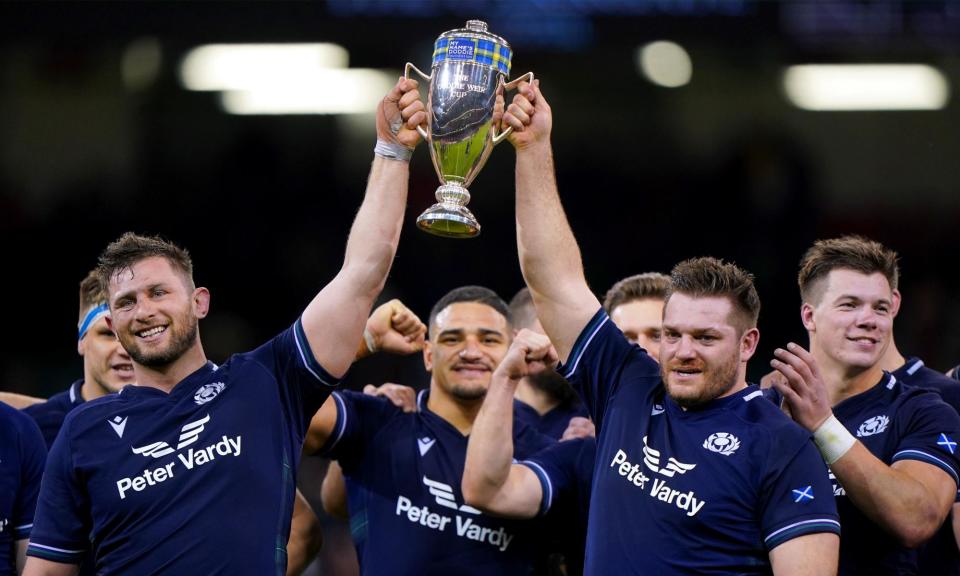 <span>Scotland's Alec Hepburn (left) and Elliot Millar-Mills hold the Doddie Weir Cup after beating Wales in Cardiff.</span><span>Photograph: Joe Giddens/PA</span>