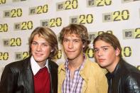 <p>Founded in the early '90s, three squeaky-clean brothers made up the group Hanson. In 1996, they released their first version of <a href="https://www.amazon.com/Mmmbop/dp/B002AV0K7K/?tag=syn-yahoo-20&ascsubtag=%5Bartid%7C10063.g.35225069%5Bsrc%7Cyahoo-us" rel="nofollow noopener" target="_blank" data-ylk="slk:“MMMBop,;elm:context_link;itc:0;sec:content-canvas" class="link ">“MMMBop,</a>” which later became a huge hit when it was polished up and re-released on their 1997 hit album, “Middle of Nowhere.” The album sold 10 million copies worldwide.</p>