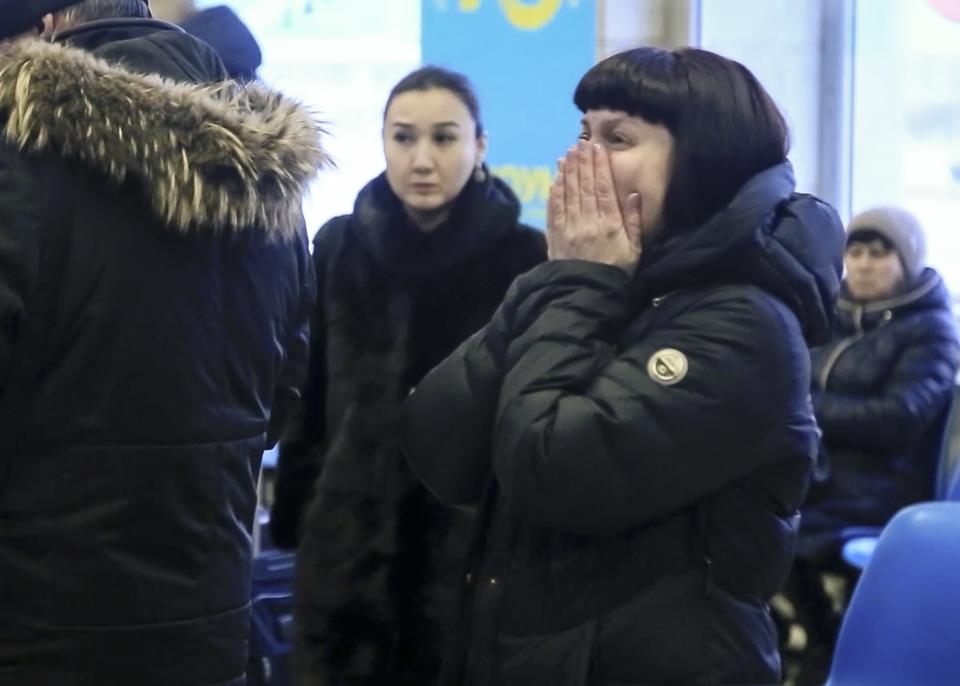 <p>In this video grab provided by the ORSK.RU web site, Relatives and friends of those on the Saratov Airlines airline plane An-148 flight that crashed near Moscow’s airport Domodedovo react while gathering at an airport outside Orsk, Russia, Feb. 11, 2018. (Orsk.ru via AP) </p>