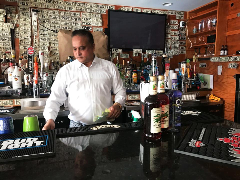 Fazly Rabbi, owner of the Coast Guard cadet hangout bar Slice, said he fears another slow weekend as cadets cut back during the shutdown. (Photo: Hayley Miller/HuffPost)