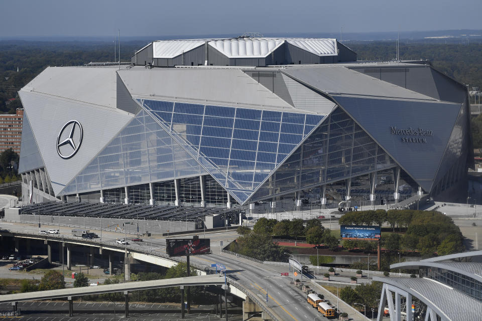 FILE - Home of the NFL football Atlanta Falcons and the MLS soccer team, Atlanta United, the Mercedes-Benz stadium is seen, Wednesday, Oct. 4, 2017, in Atlanta. There are 23 venues bidding to host soccer matches at the 2026 World Cup in the United States, Mexico and Canada. (AP Photo/Mike Stewart, File)