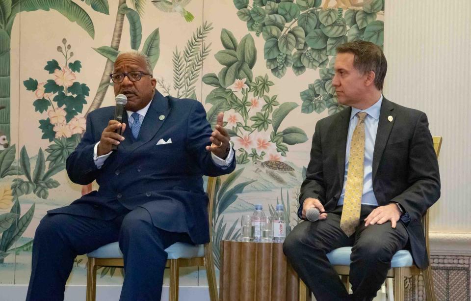 West Palm Beach Mayor Keith James, left, speaks during the second annual Palm Beach Summit on Countering Antisemitism at the Colony Hotel as State Attorney Dave Aronberg, listens.