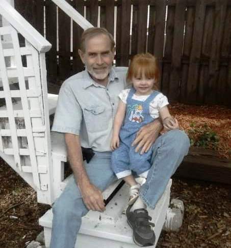 Willow Toft as a toddler with her beloved late grandpa, George Bryan, who she'd bring a ball to for games of "fetch."