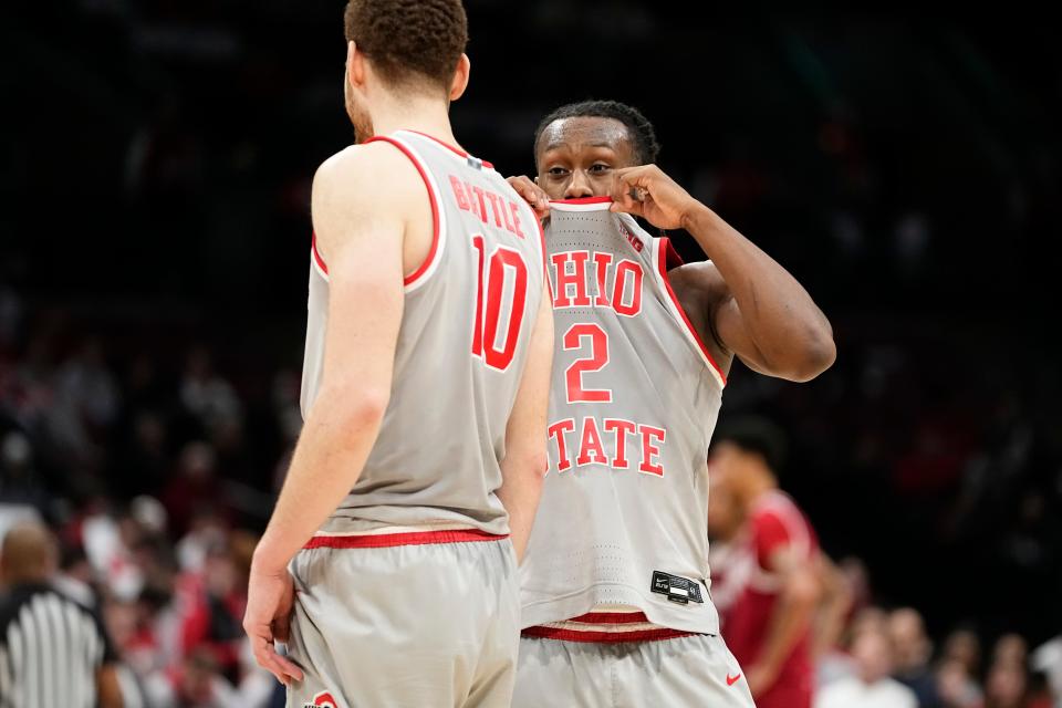 Feb 6, 2024; Columbus, Ohio, USA; Ohio State Buckeyes guard Bruce Thornton (2) talks to forward Jamison Battle (10) during the second half of the men’s basketball game against the Indiana Hoosiers at Value City Arena. Ohio State lost 76-73.