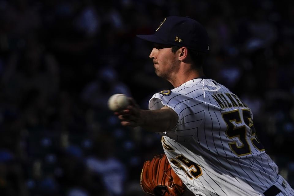 Milwaukee Brewers relief pitcher Hoby Milner throws during the eighth inning of a baseball game against the Pittsburgh Pirates Saturday, July 9, 2022, in Milwaukee. (AP Photo/Morry Gash)