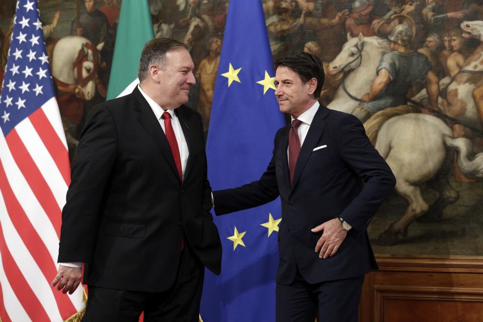 Italian Premier Giuseppe Conte, right, meets U.S. Secretary of State, Mike Pompeo, at Chigi Palace premier's office in Rome, Tuesday, Oct. 1, 2019. 2019. U.S. Secretary of State Mike Pompeo is in Italy at the start of a four-nation tour of Europe as the push to impeach President Donald Trump gains steam at home. (AP Photo/Andrew Medichini)