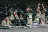 South Korea players watch from the dugout during the sixth inning of the Little League World Series Championship baseball game against Endwell, N.Y., Sunday, Aug. 28, 2016, in South Williamsport, Pa. (AP Photo/Matt Slocum)