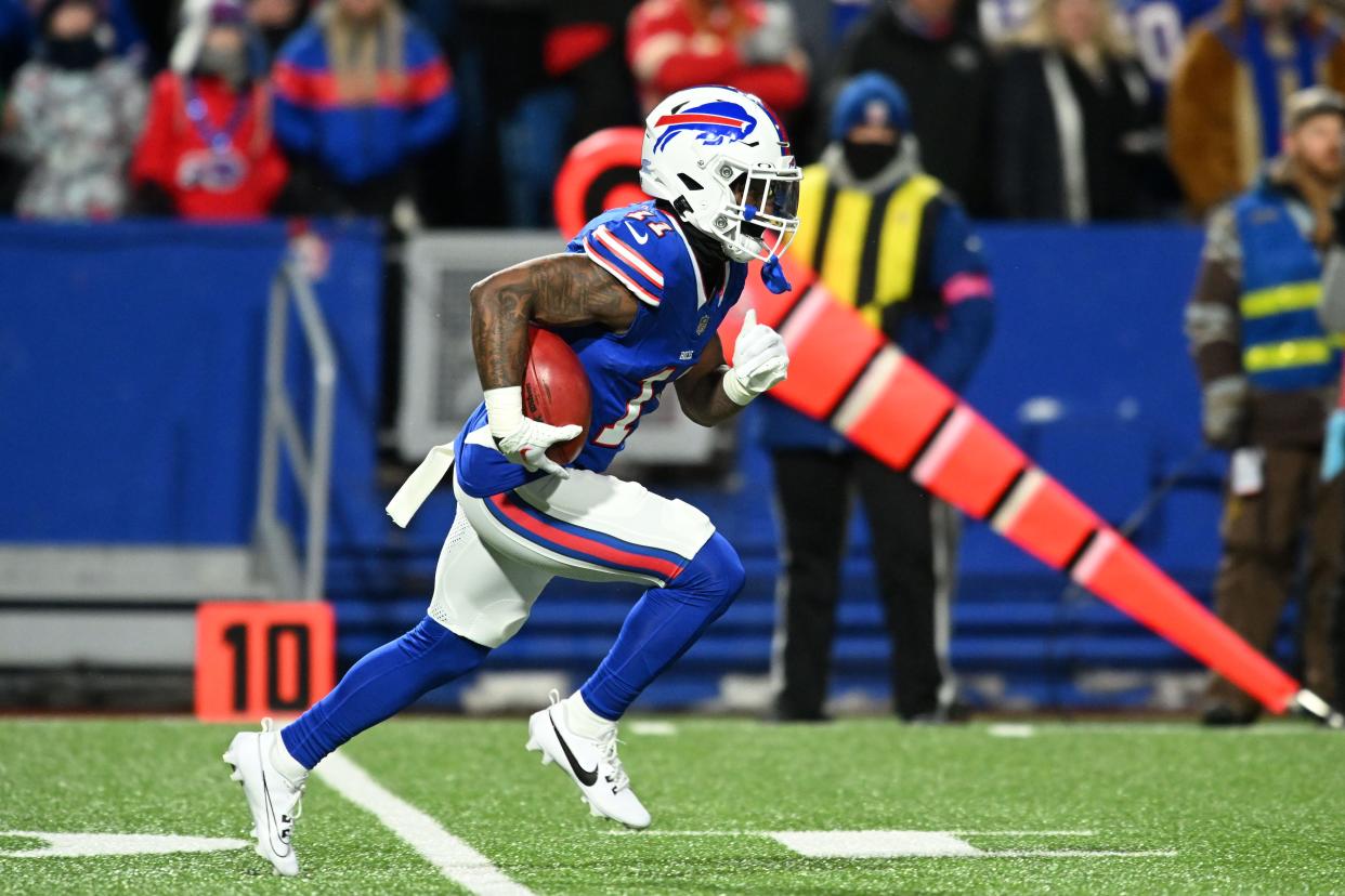 Buffalo Bills wide receiver Deonte Harty (11) returns a kickoff against the Kansas City Chiefs in the first half of the 2024 AFC divisional round game at Highmark Stadium.