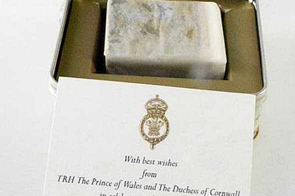 BEST QUALITY AVAILABLE.Undated handout photo issued by Mellors & Kirk of a slice of cake baked for the Duke and Duchess of Cambridge's wedding, which is to be auctioned next week. PRESS ASSOCIATION Photo. Issue date: Friday April 4, 2014. Auctioneers Mellors and Kirk are expecting the slice of fruit cake to fetch between ï¿½50 and ï¿½150 when it goes up for sale on Wednesday April 9. See PA story ROYAL Cake. Photo credit should read: Mellors & Kirk/PA WireNOTE TO EDITORS: This handout photo may only be used in for editorial reporting purposes for the contemporaneous illustration of events, things or the people in the image or facts mentioned in the caption. Reuse of the picture may require further permission from the copyright holder.