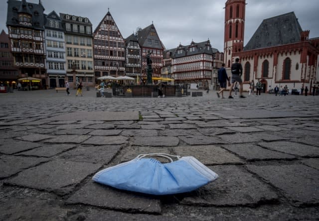 A face mask left on the floor of the Roemerberg square in Frankfurt, Germany 