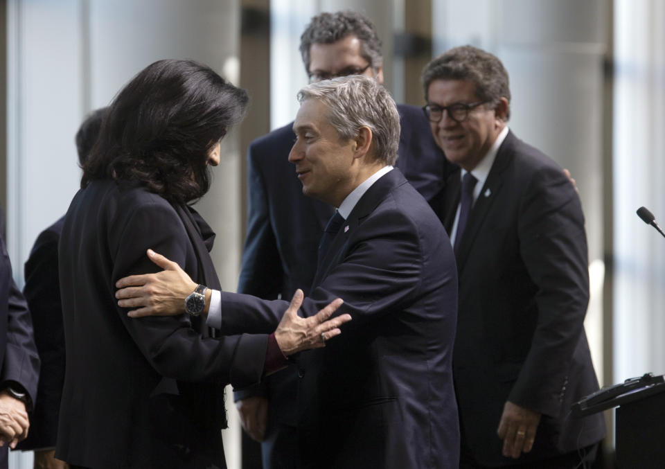 Canadian Foreign Affairs Minister Francois-Philippe Champagne speaks with Colombian Foreign Minister Claudia Blum de Bareri following the closing news conference at the Lima Group Ministerial meetings in Gatineau, Quebec, Thursday, Feb. 20, 2020. (Adrian Wyld/The Canadian Press via AP)