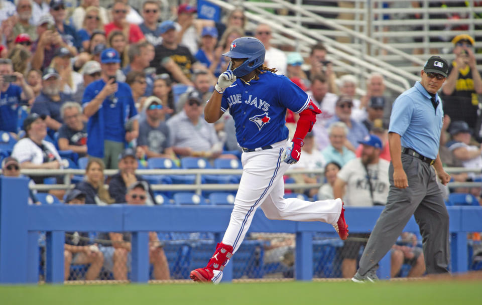 Toronto Blue Jays' Vladimir Guerrero Jr. rounds third after hitting a home run against the New York Yankees during a spring training baseball game at TD Ballpark in Dunedin, Fla., Saturday, March 18, 2023. T(Mark Taylor/The Canadian Press via AP)