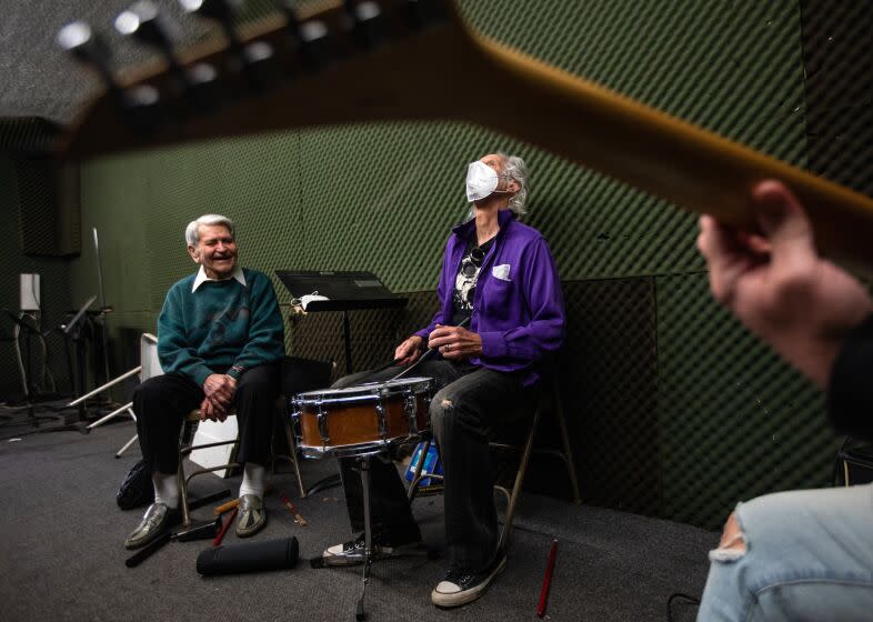 Jazz drummer Steve Hideg, 91, left, Doors' drummer John Densmore, middle, and guitarist Leo Vaz in Los Angeles.