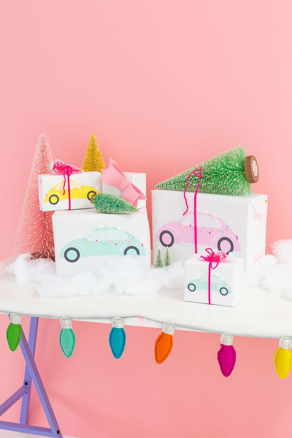 <p>These miniature trees aren't just an adorable, classic addition to your Christmas mantel; they also make for pretty sweet wrapping accessories. (There's even a free car printable included with this tutorial!)</p><p><strong>Get the tutorial at <a href="http://www.awwsam.com/2017/12/diy-bottle-brush-car-gift-wrap.html" rel="nofollow noopener" target="_blank" data-ylk="slk:Aww Sam;elm:context_link;itc:0;sec:content-canvas" class="link ">Aww Sam</a>.</strong></p><p><strong><a class="link " href="https://go.redirectingat.com?id=74968X1596630&url=https%3A%2F%2Fwww.walmart.com%2Fsearch%2F%3Fquery%3Dbottlebrush%2Btrees&sref=https%3A%2F%2Fwww.elledecor.com%2Flife-culture%2Fentertaining%2Fg38414958%2Ftop-christmas-gift-wrapping-ideas%2F" rel="nofollow noopener" target="_blank" data-ylk="slk:SHOP BOTTLEBRUSH TREES;elm:context_link;itc:0;sec:content-canvas">SHOP BOTTLEBRUSH TREES</a><br></strong></p>