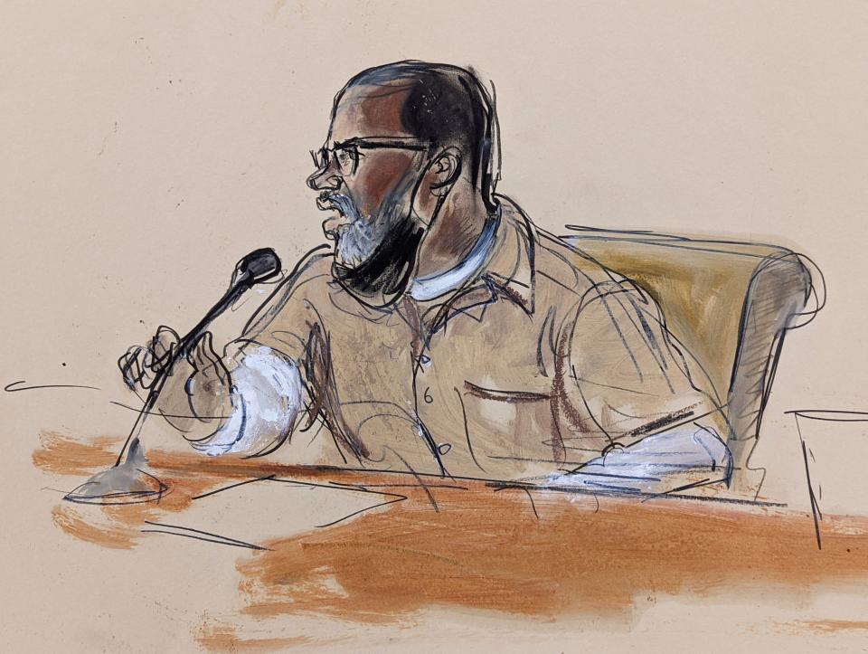 In this courtroom sketch, R. Kelly briefly addresses Judge Ann Donnelly during his sentencing in federal courton June 29, 2022. R. Kelly was sentenced to 30 years in prison for using his superstardom to subject young fans — some just children — to systematic sexual abuse.
