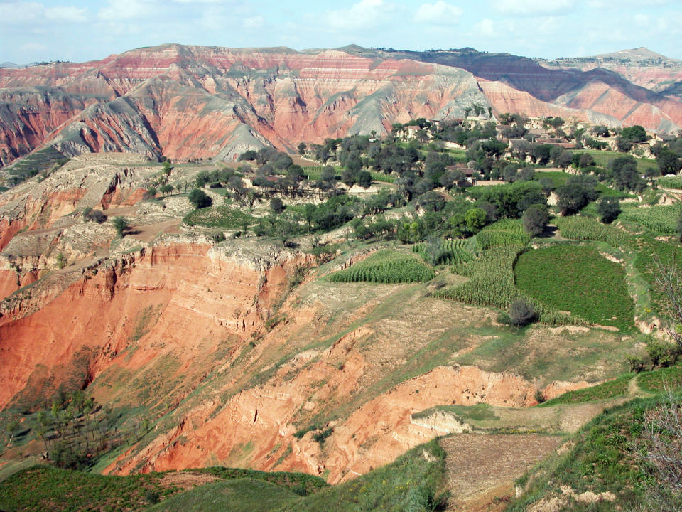 Cenozoic red deposits of the Linxia Basin in Gansu Province, northwestern China.  (Tao Deng)