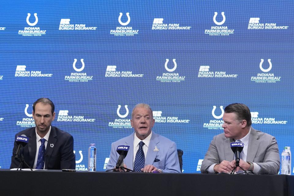 Indianapolis Colts owner Jim Irsay, middle, speaks as Shane Steichen, left, and Indianapolis Colts General Manager Chris Ballard, listen during a news conference, Tuesday, Feb. 14, 2023, in Indianapolis. Steichen was introduced as the Colts new head coach. (AP Photo/Darron Cummings)